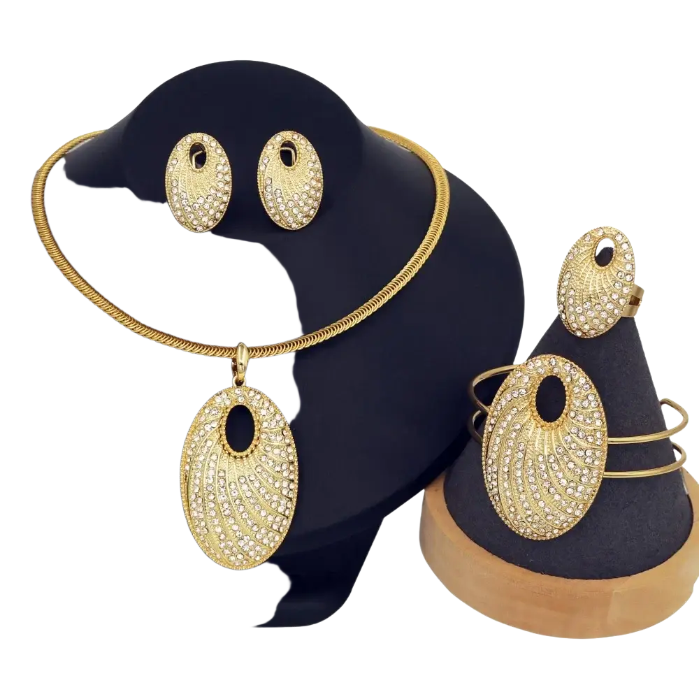 Gold plated rhinestone bridal jewelry set with gold toned necklace oval pendant matching earrings and bracelet