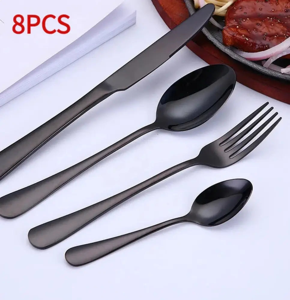Set of eight black matte-finished stainless steel cutlery pieces from luxury gold-plated stainless steel steak set