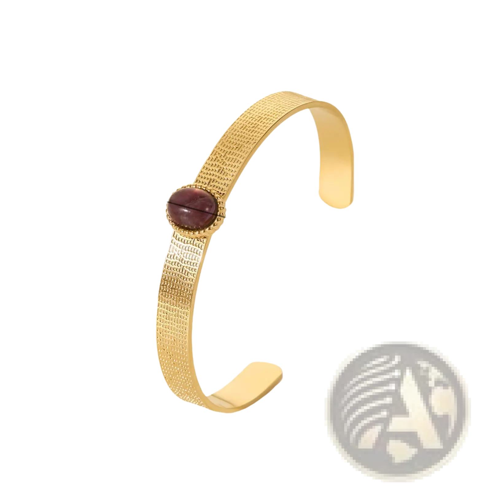 Gold plated stainless steel bangle bracelet with a textured gold-toned surface and an oval burgundy zirconia gemstone
