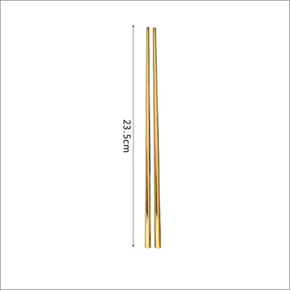 A pair of sleek 23.5cm-long gold stainless steel chopsticks with a smooth reflective finish from luxury gold 304 set