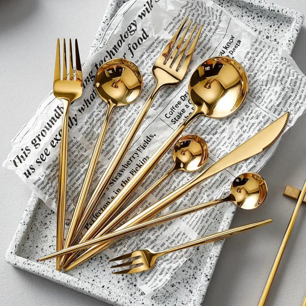 Luxury gold 304 stainless steel cutlery set with sleek modern design and reflective golden surfaces