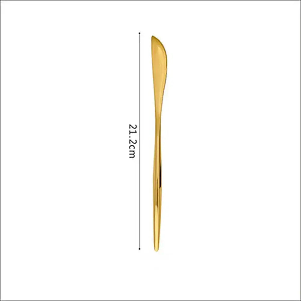 A sleek 21.2cm gold-colored spoon with a smooth reflective surface and curved handle from luxury gold 304 stainless steel cutlery set