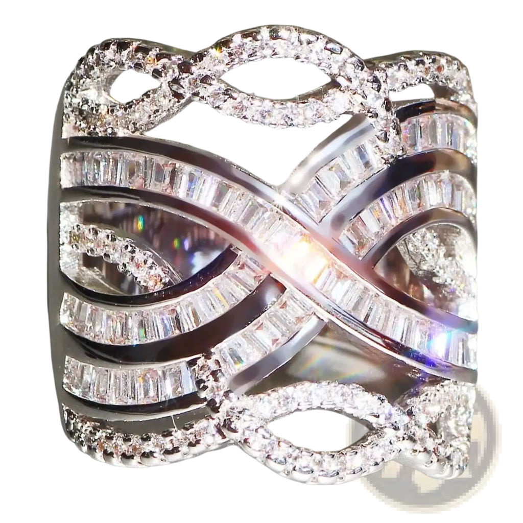 A dazzling silver infinity ring with gold plating featuring baguette and round brilliant cubic zirconia stones for engagement