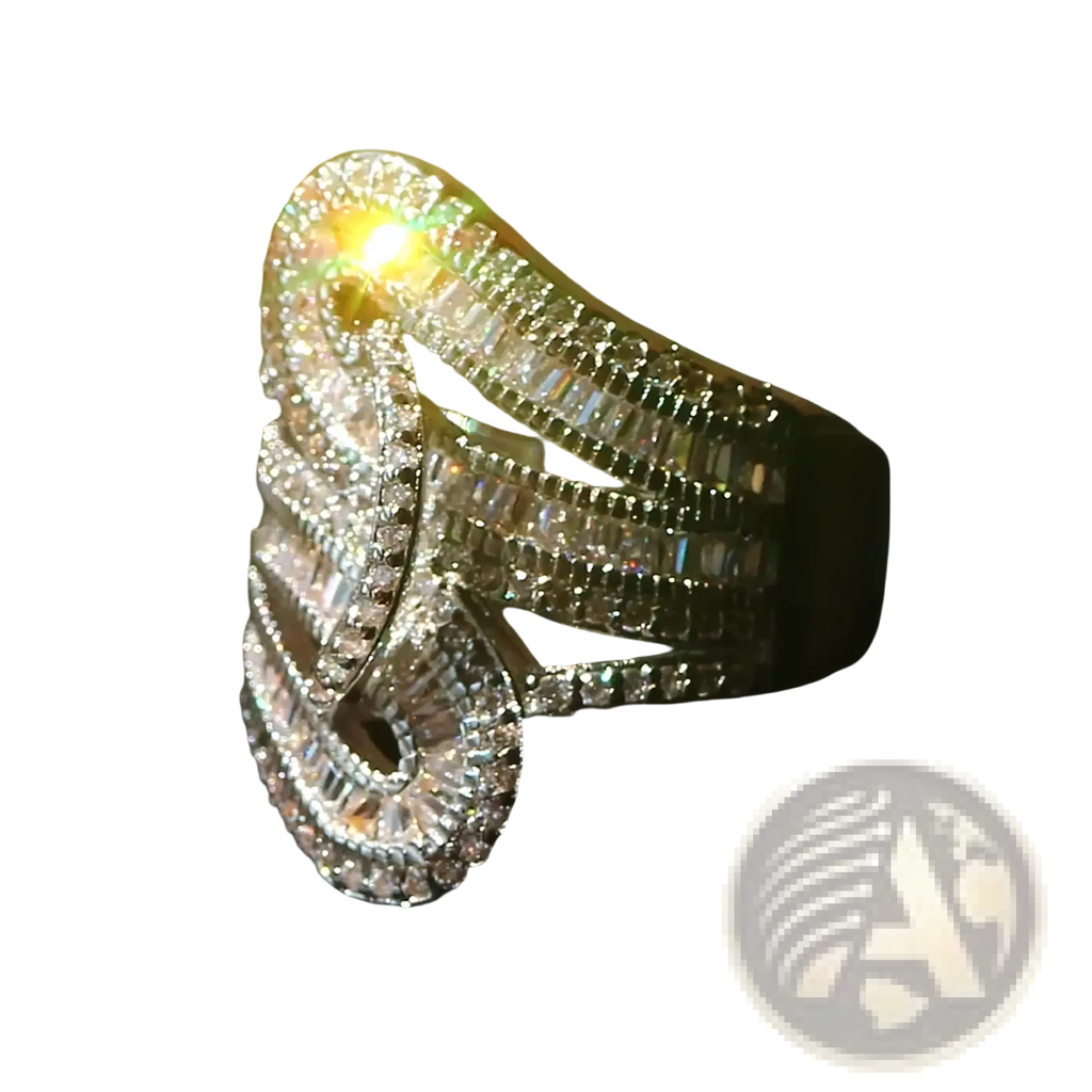 Gold plated zircon baguette crystal engagement ring with multiple rows of clear crystals in an elegant flowing design