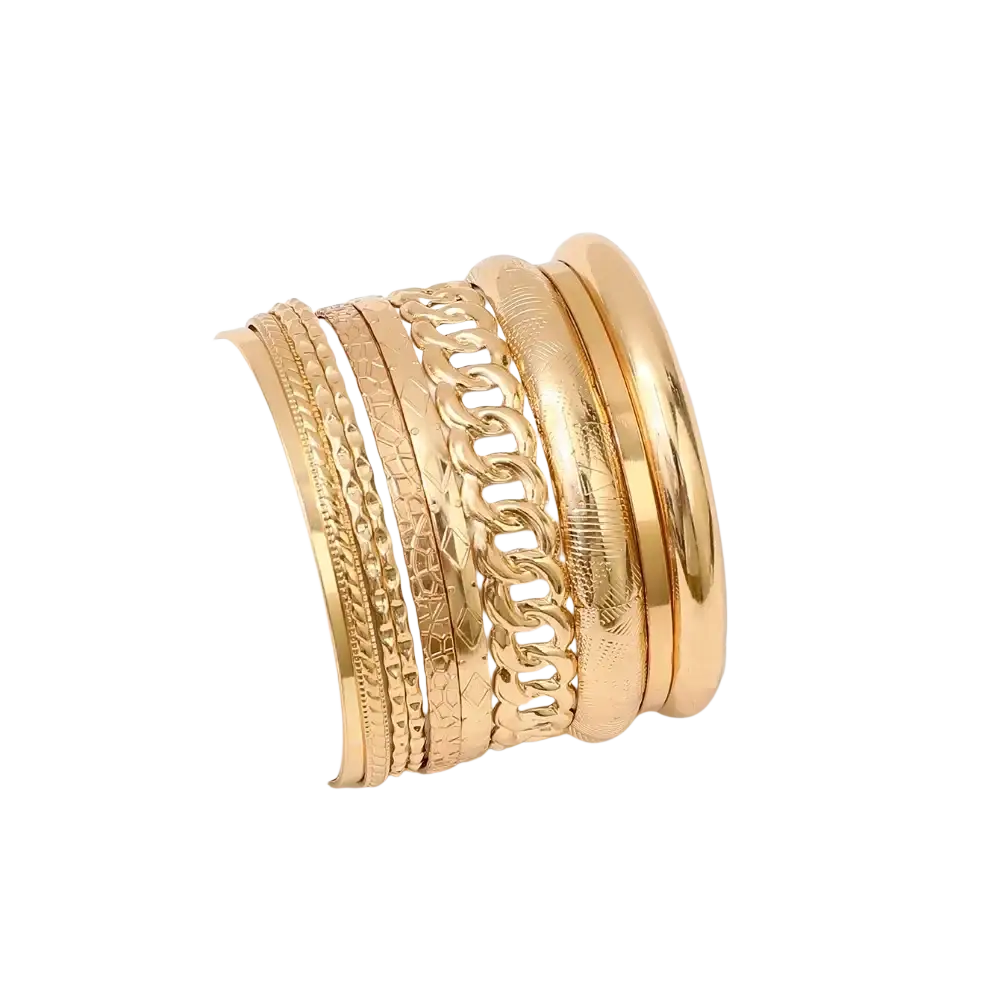 A stack of gold-toned gold punk bangle bracelets featuring various textures and embossed chain link designs