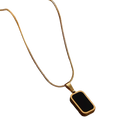 Gold-toned snake chain necklace with a rectangular black enamel pendant for women elegant accessory