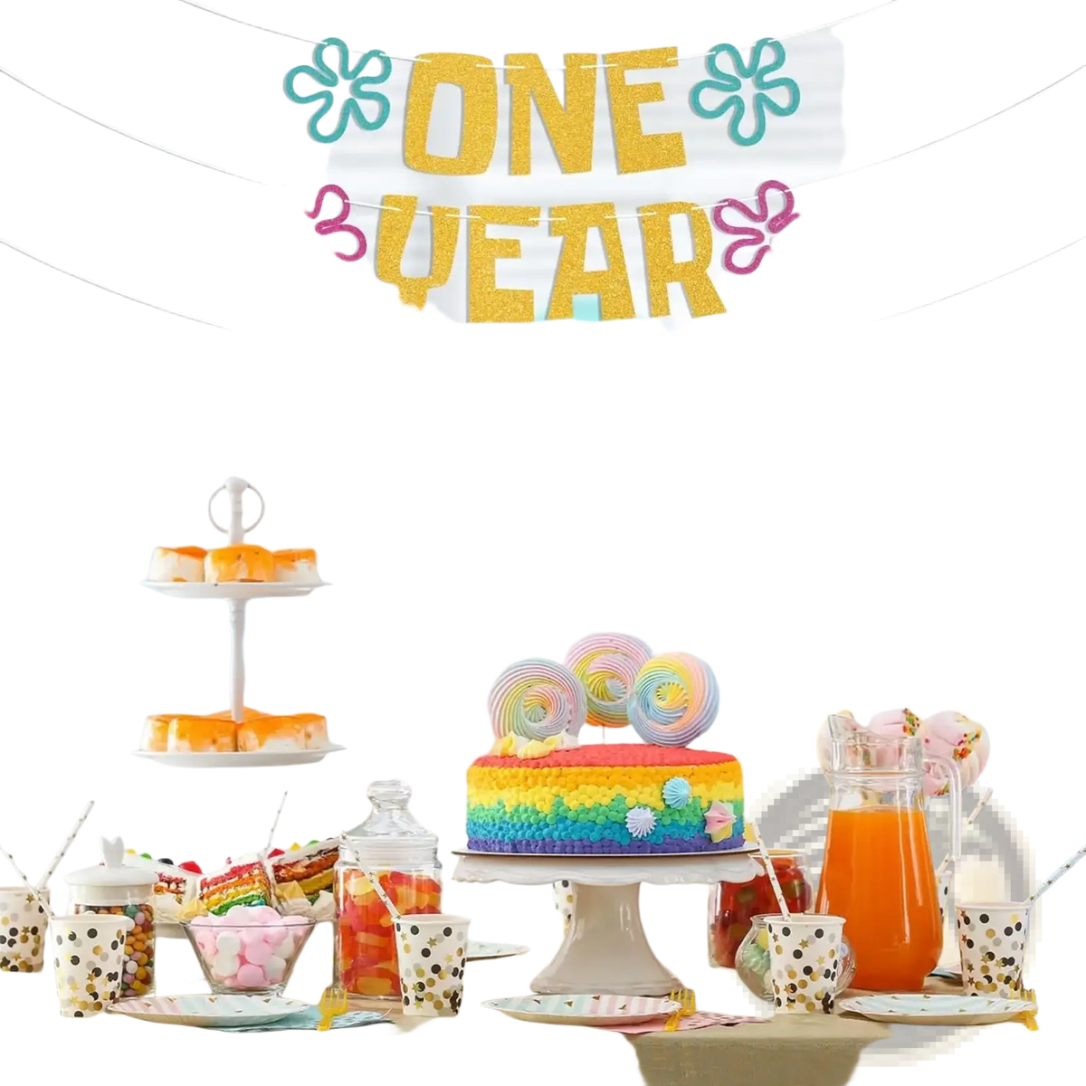 Gold sea animal first birthday banner undersea decor with a rainbow-colored cake featuring rainbow frosting and colorful lollipops