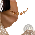 Gold seashell starfish choker necklace featuring gold-toned intricate sea-themed charms including shells starfish and ammonite