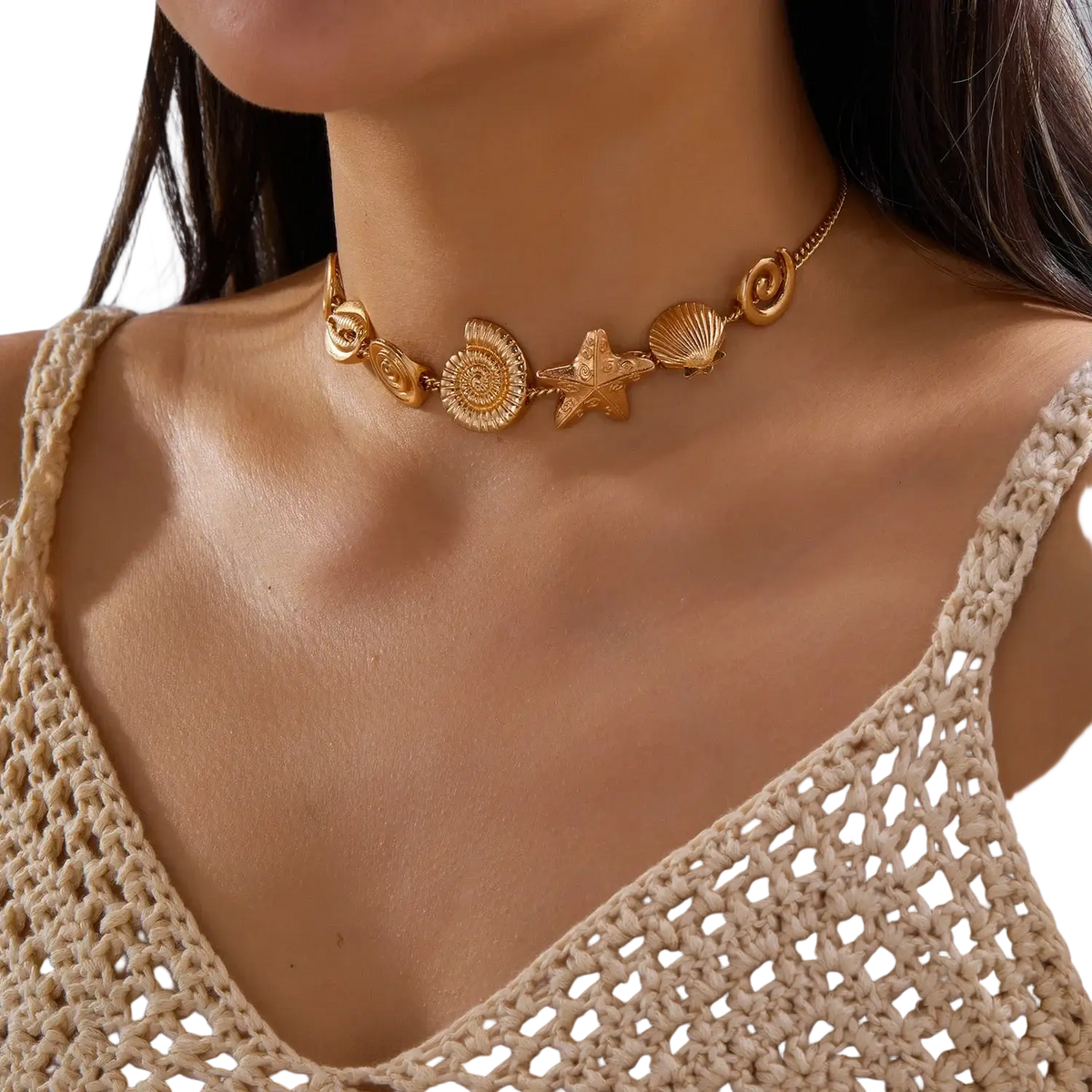 Gold-toned choker necklace featuring intricate sea-themed charms including starfish seashell and spiral shell