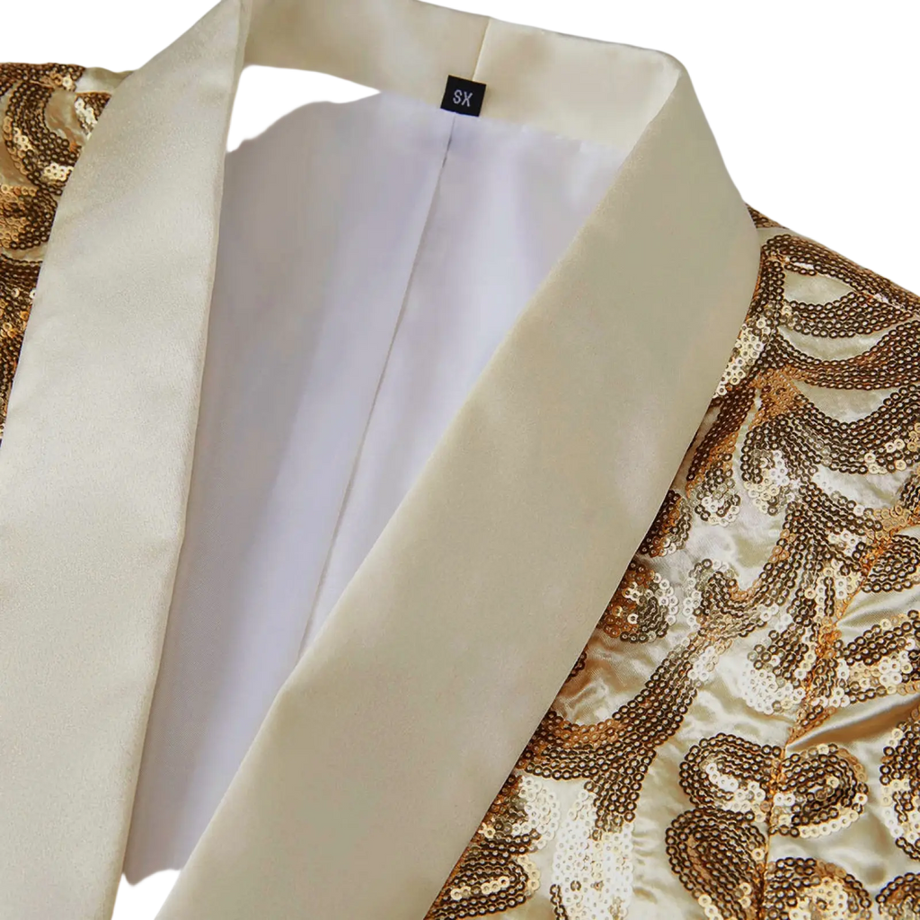 A shimmering gold sequin mens suit jacket with a cream satin lapel and inner lining featuring a retro floral design