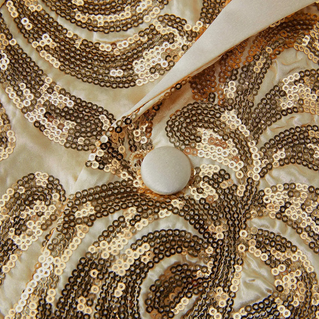 A gold sequin mens suit jacket in cream satin with intricate gold and bronze floral patterns and a white button fastening