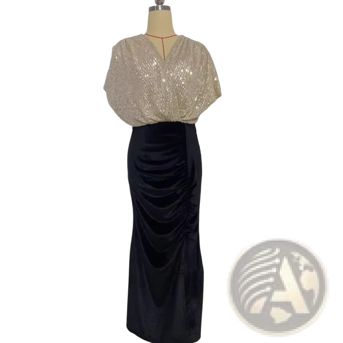 Gold sequined v-neck a-line formal gown with short puffed sleeves and a black satin ruched skirt