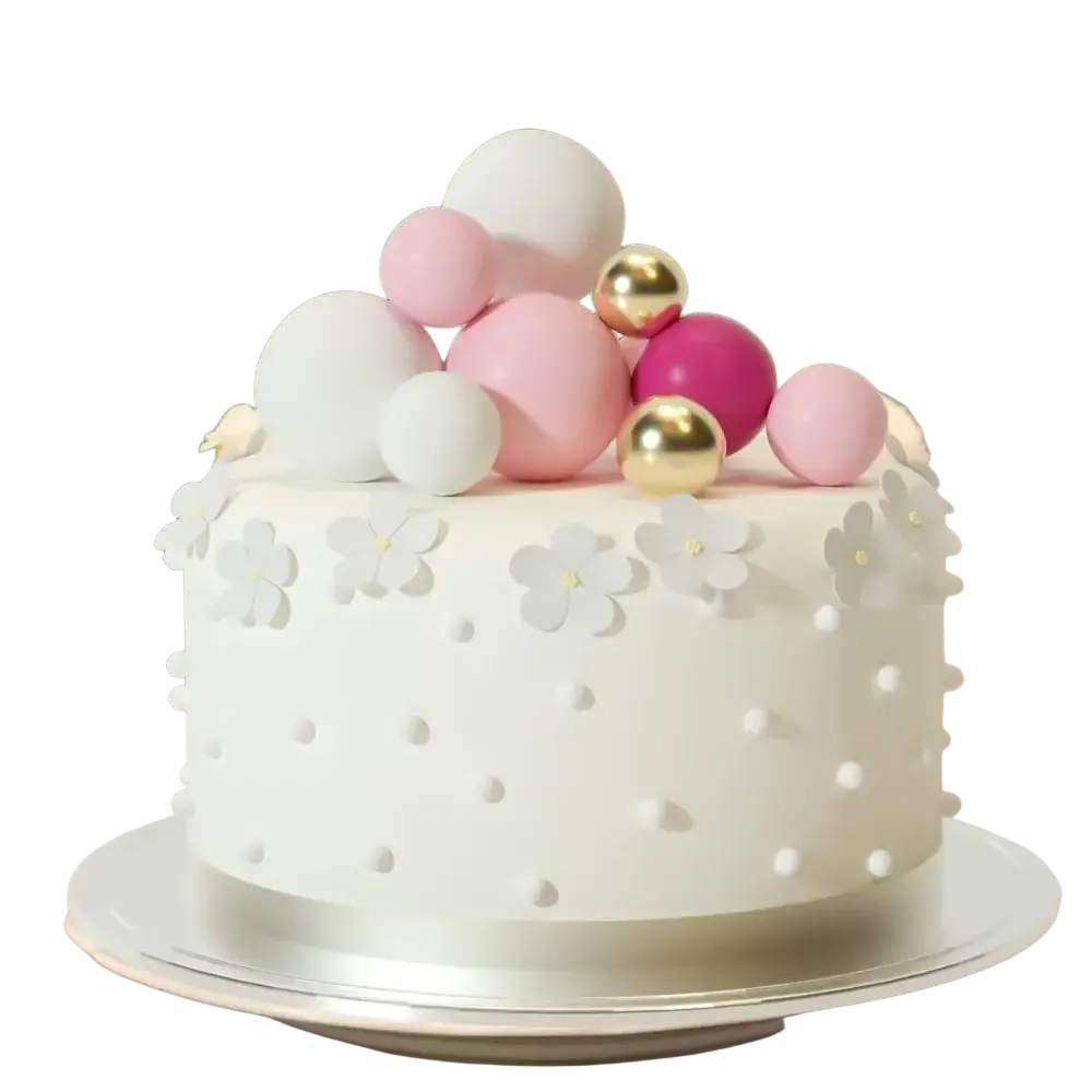 A white frosted cake decorated with pastel pink, gold, and magenta foam balls from a 20pcs birthday party decor set