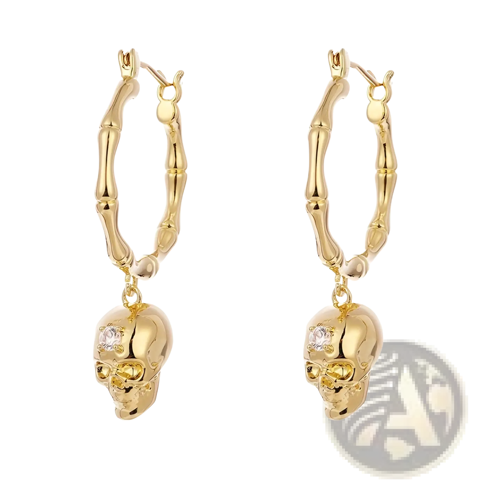 Gold skull tassel earrings with bamboo hoop design and clear zircon gemstone set in the forehead