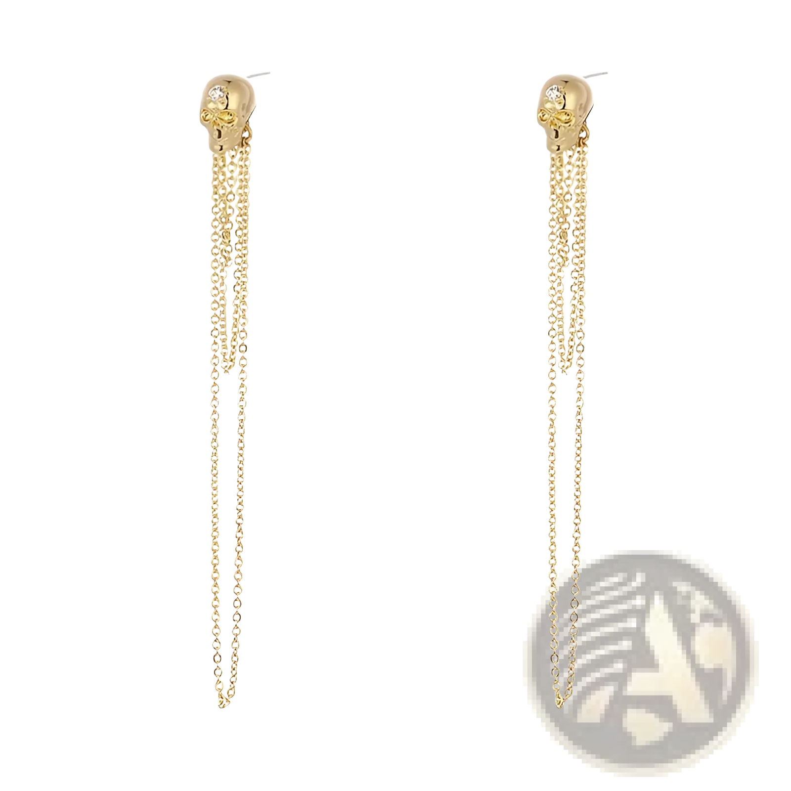 Gold skull tassel earrings with dangling chains and zircon accents featuring a small gemstone on the forehead