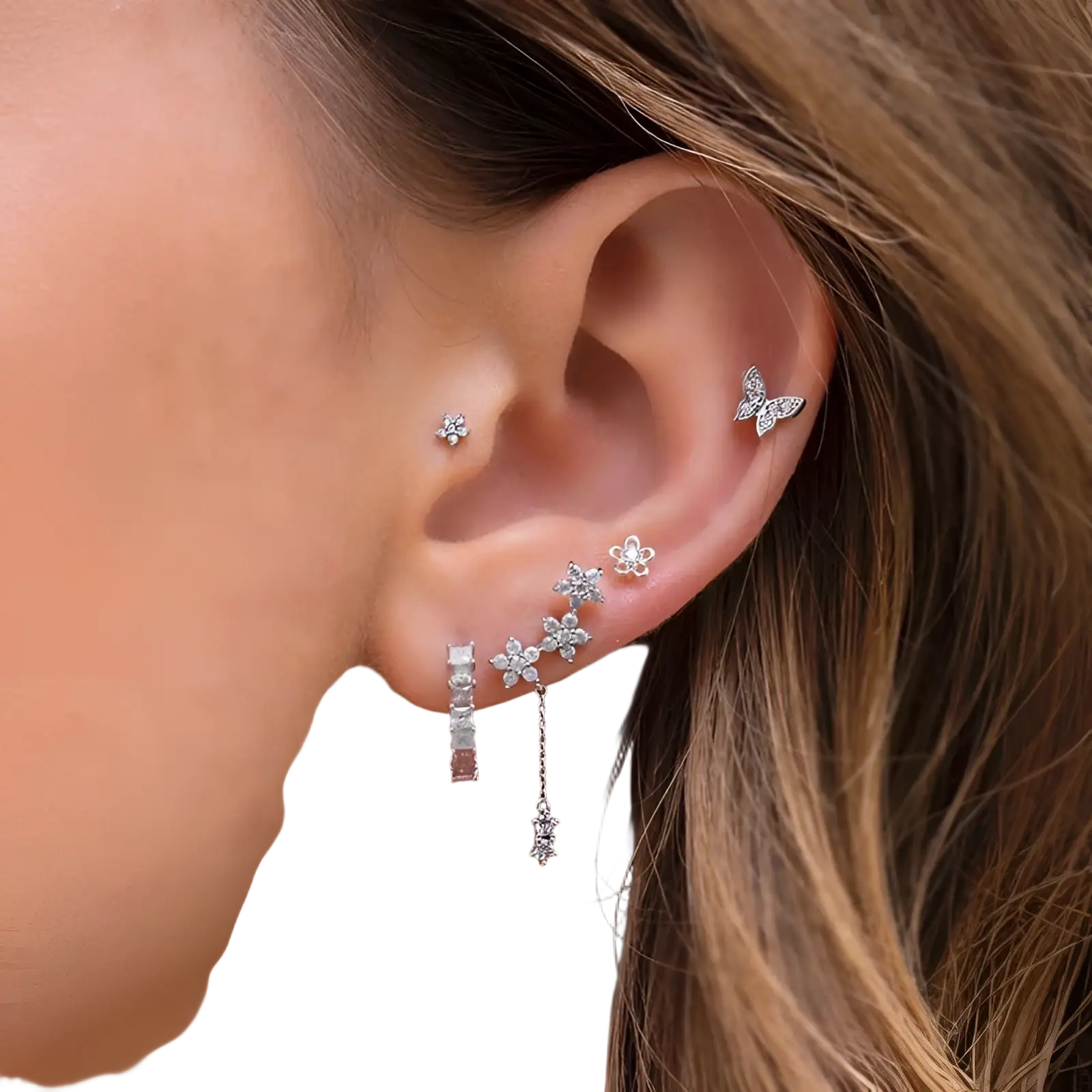 Silver-toned ear cuff from gold star and moon butterfly earring set with cubic zirconia flowers and a star charm