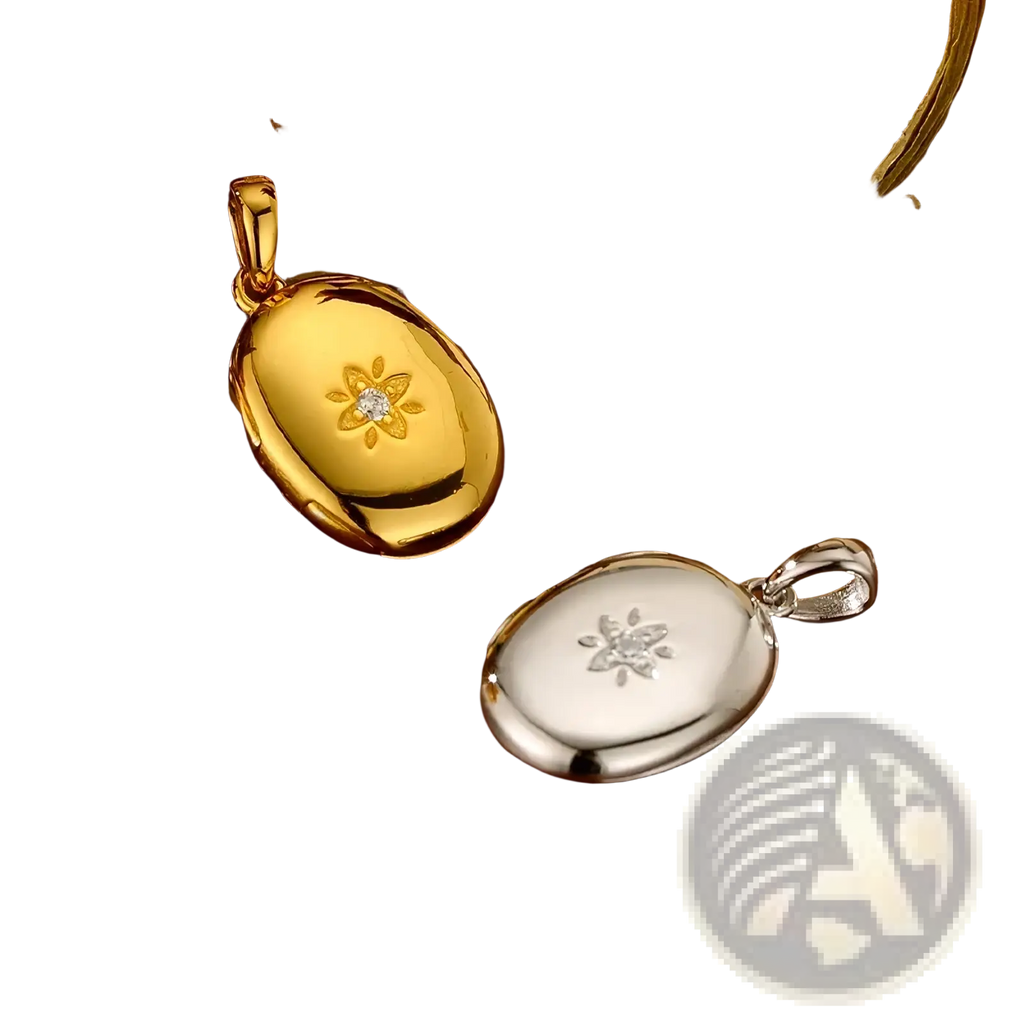 Gold starburst locket necklace featuring gold and silver oval pendants with floral engravings and central diamond accents