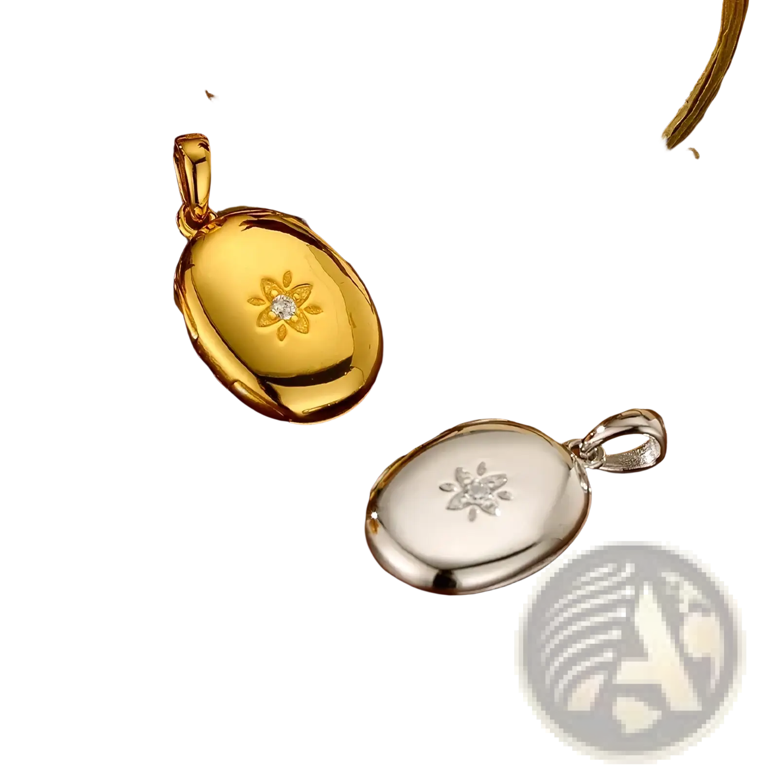 Gold starburst locket necklace featuring gold and silver oval pendants with floral engravings and central diamond accents