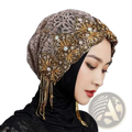 Elegant taupe lace gold tassel draped turban hat with intricate gold beading crystal flowers and dangling tassels