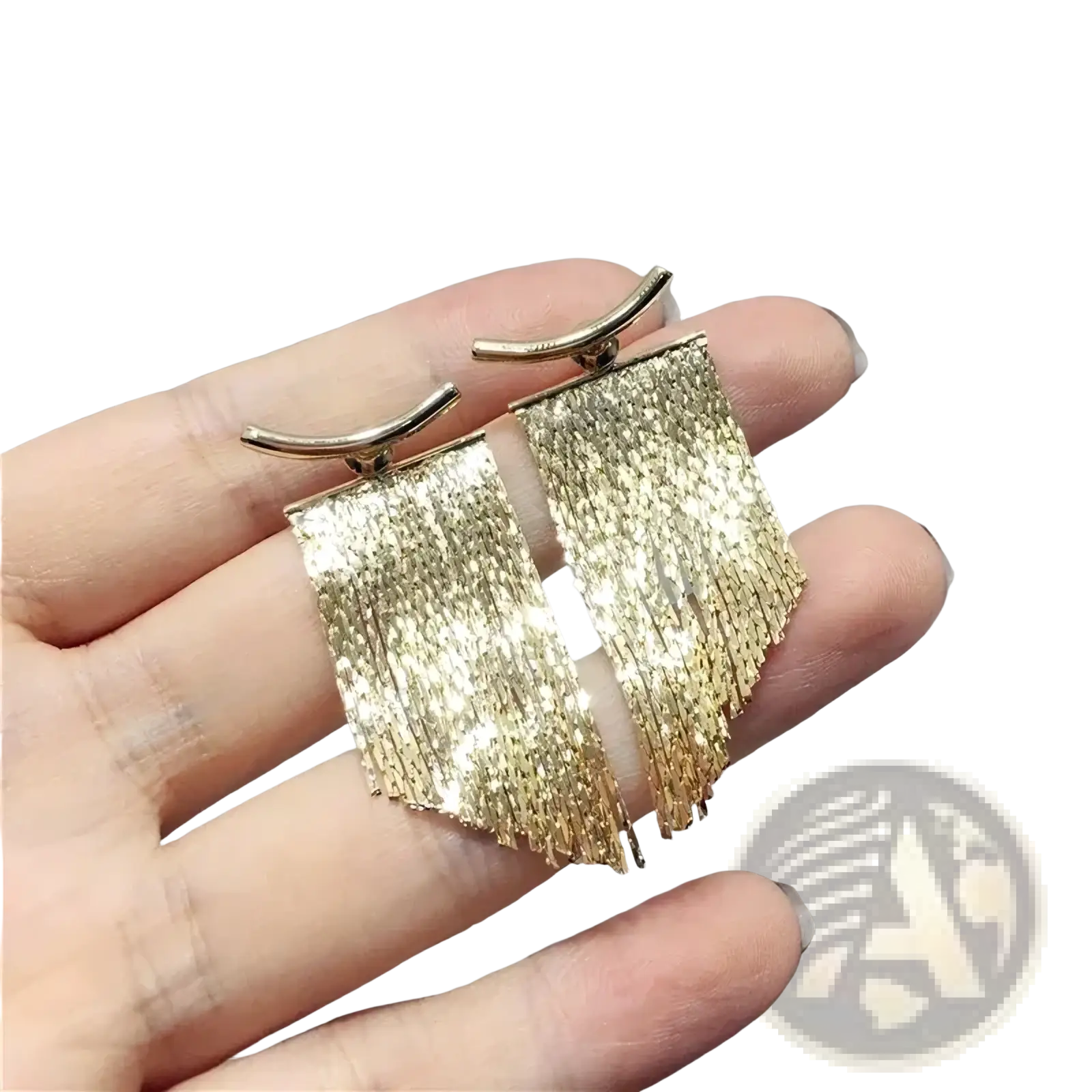 Gold tassel fringe statement earrings with shimmering gold color textured metallic finish and curved hooks