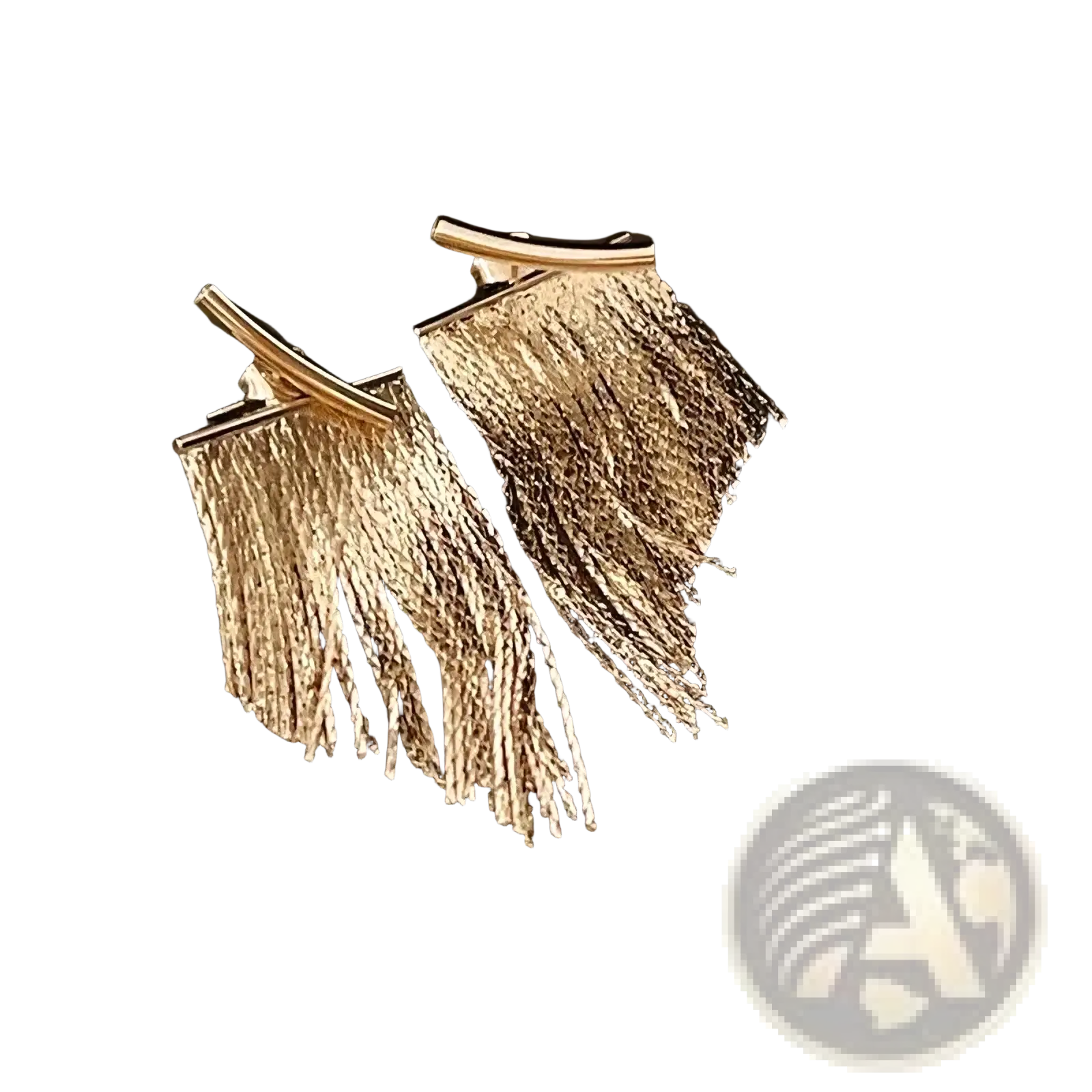 Gold tassel fringe statement earrings featuring gold-toned delicate metallic threads cascading from a curved bar