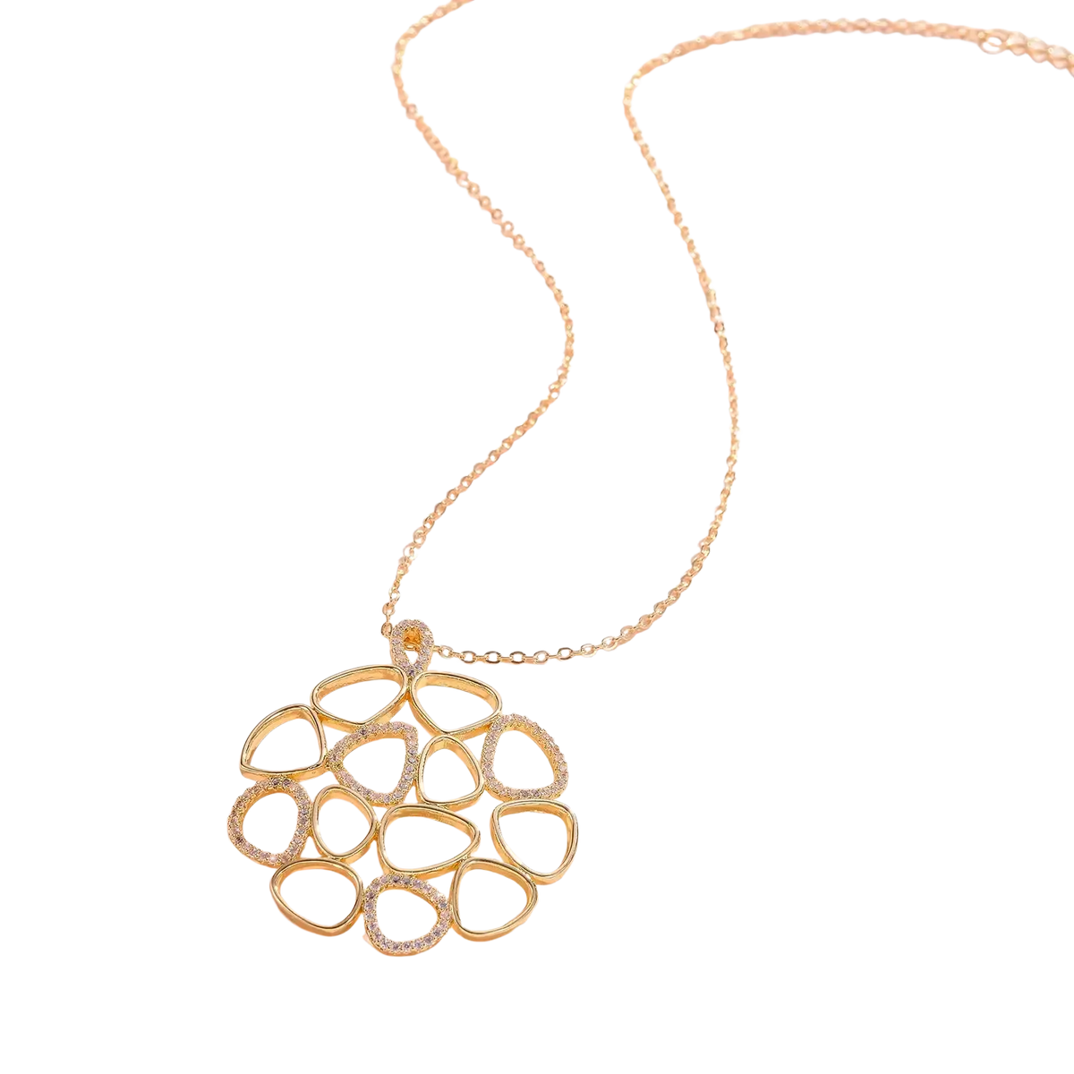 Gold teardrop pendant necklace for women with a gold-toned delicate chain and openwork pendant featuring clear stones