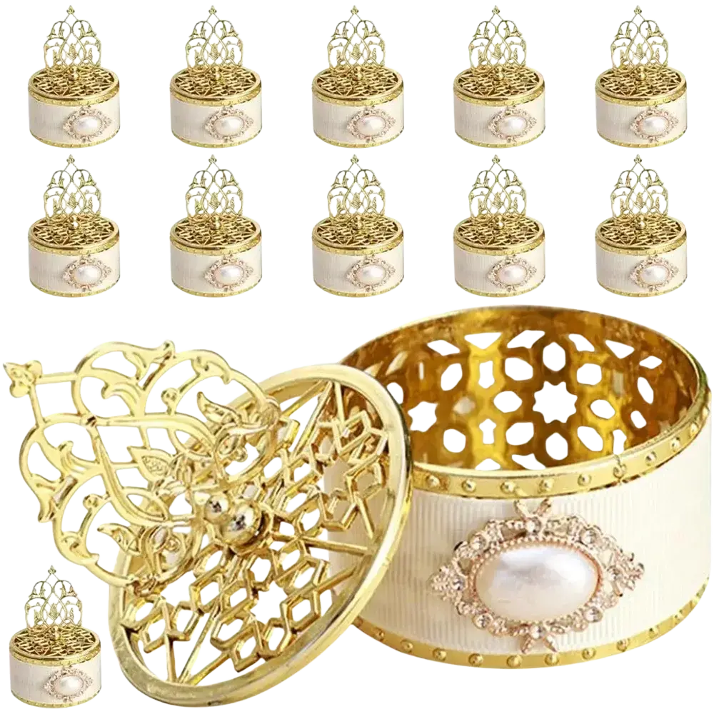 Elegant gold wedding candy box with cream filigree lid, pearl accent, and beaded trim for wedding candy favors