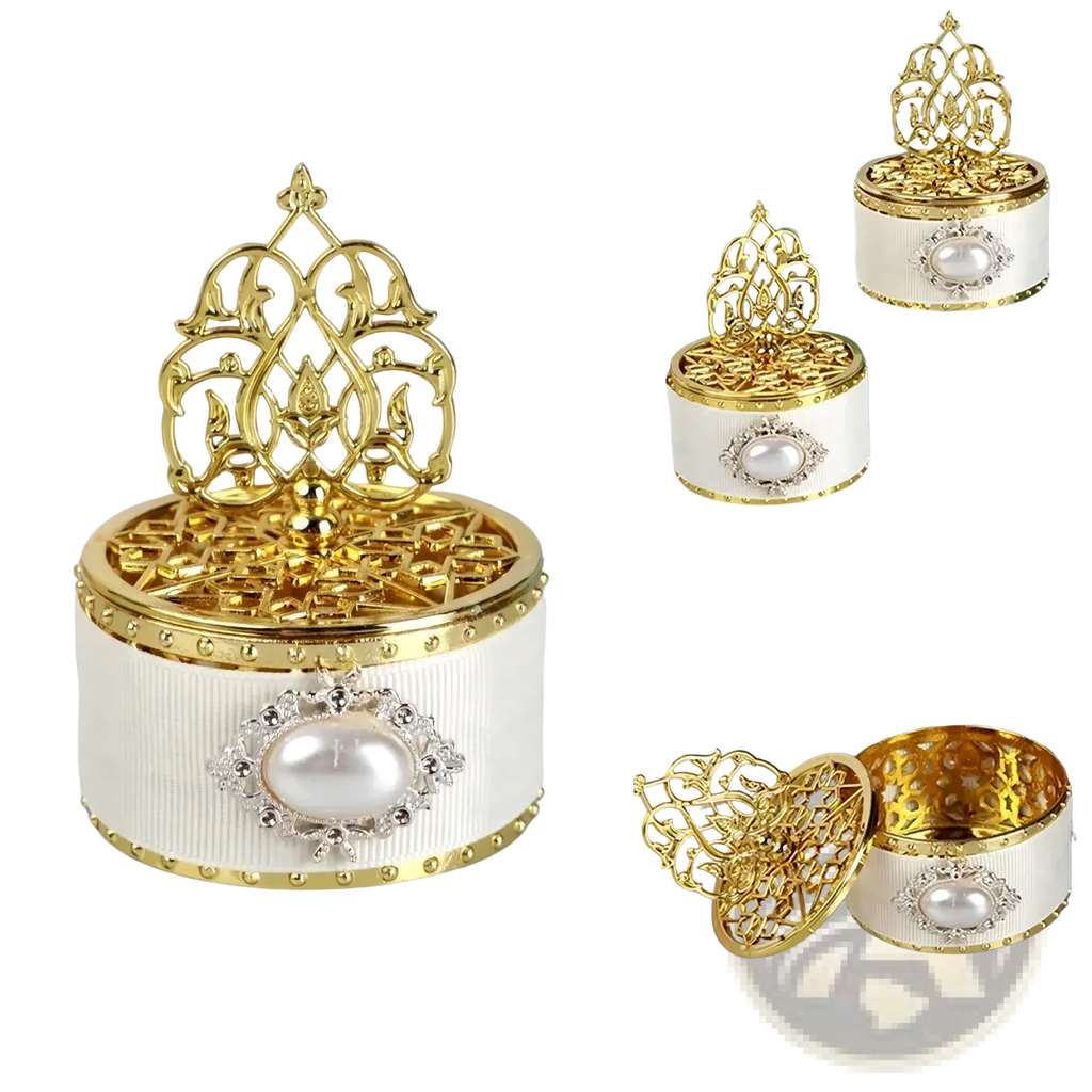 Elegant white and gold ornamental gold wedding candy box with pearl centerpiece and intricate filigree lid for favors