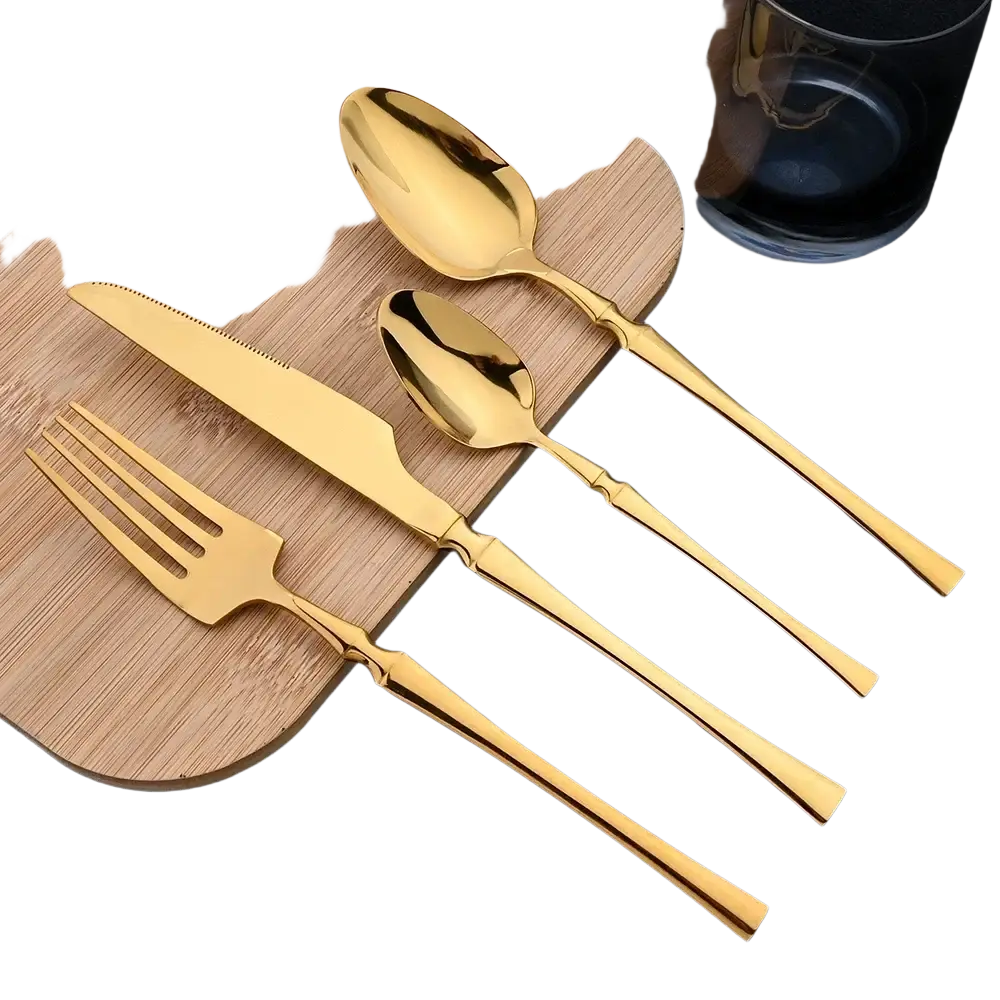 Gold and white stainless steel 16 piece flatware set featuring golden stainless steel cutlery with sleek modern handles