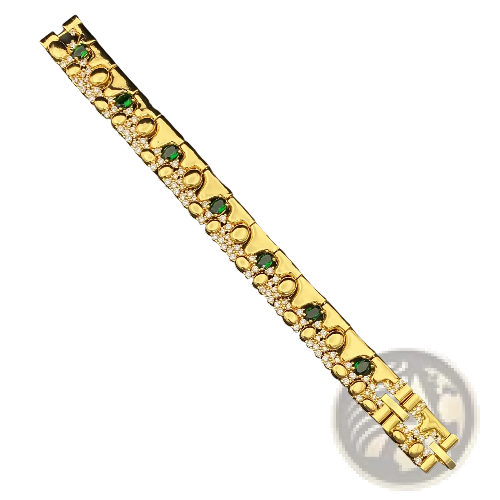 Gold zircon geometric jewelry set featuring a gold-toned bracelet with green gemstones and clear crystals in an ornate design
