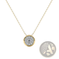A delicate gold sterling silver necklace with a round zircon pendant encrusted with sparkling diamonds