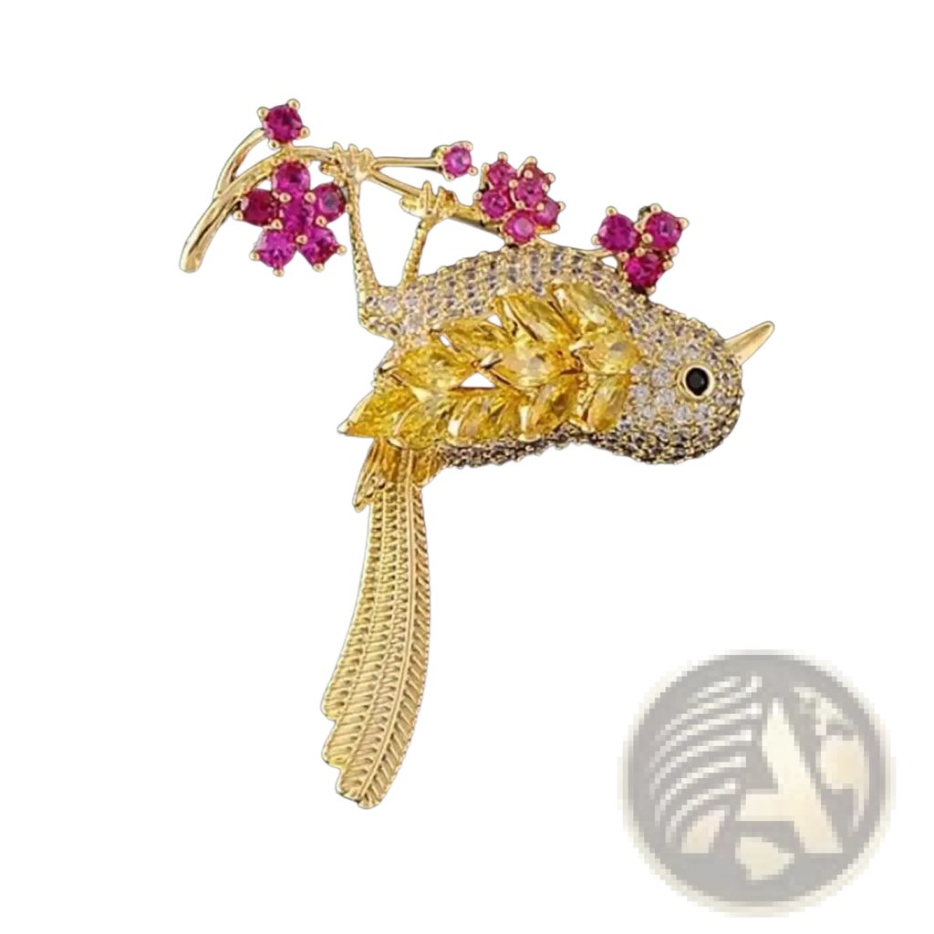 Golden bird brooch gemstone animal clothing pin with yellow and clear gemstones and pink ruby blossom branch detail