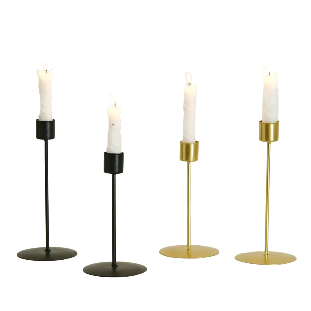 Set of four minimalist golden European style metal candle holders with black and gold cylindrical bases for home decor