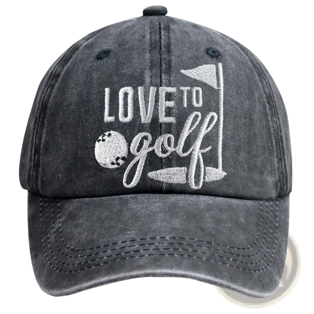 A dark gray distressed cotton baseball cap embroidered with white love to golf text and golf-themed graphics