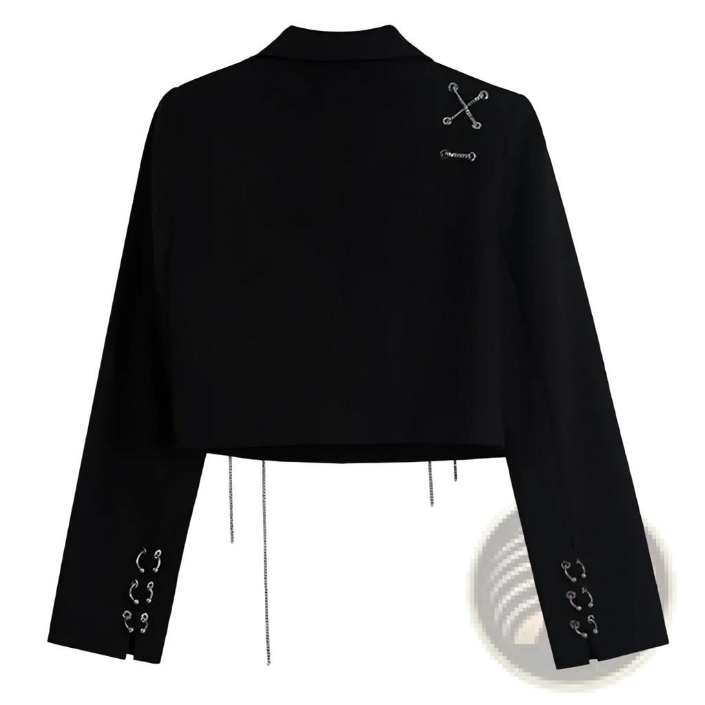 Black cropped blazer with long sleeves featuring silver metallic pin and chain embellishments on shoulders and cuffs