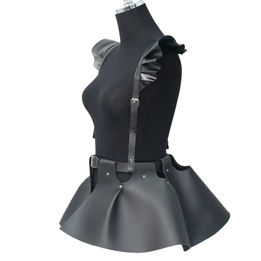 Black leather gothic harness skirt with ruffled shoulder straps and flared peplum-style hem