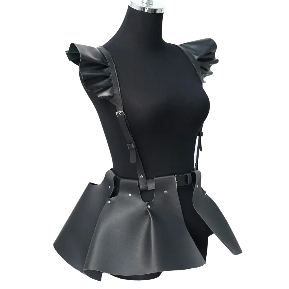 Black faux leather gothic leather harness skirt with ruffle hem featuring peplum top and ruffled shoulder straps