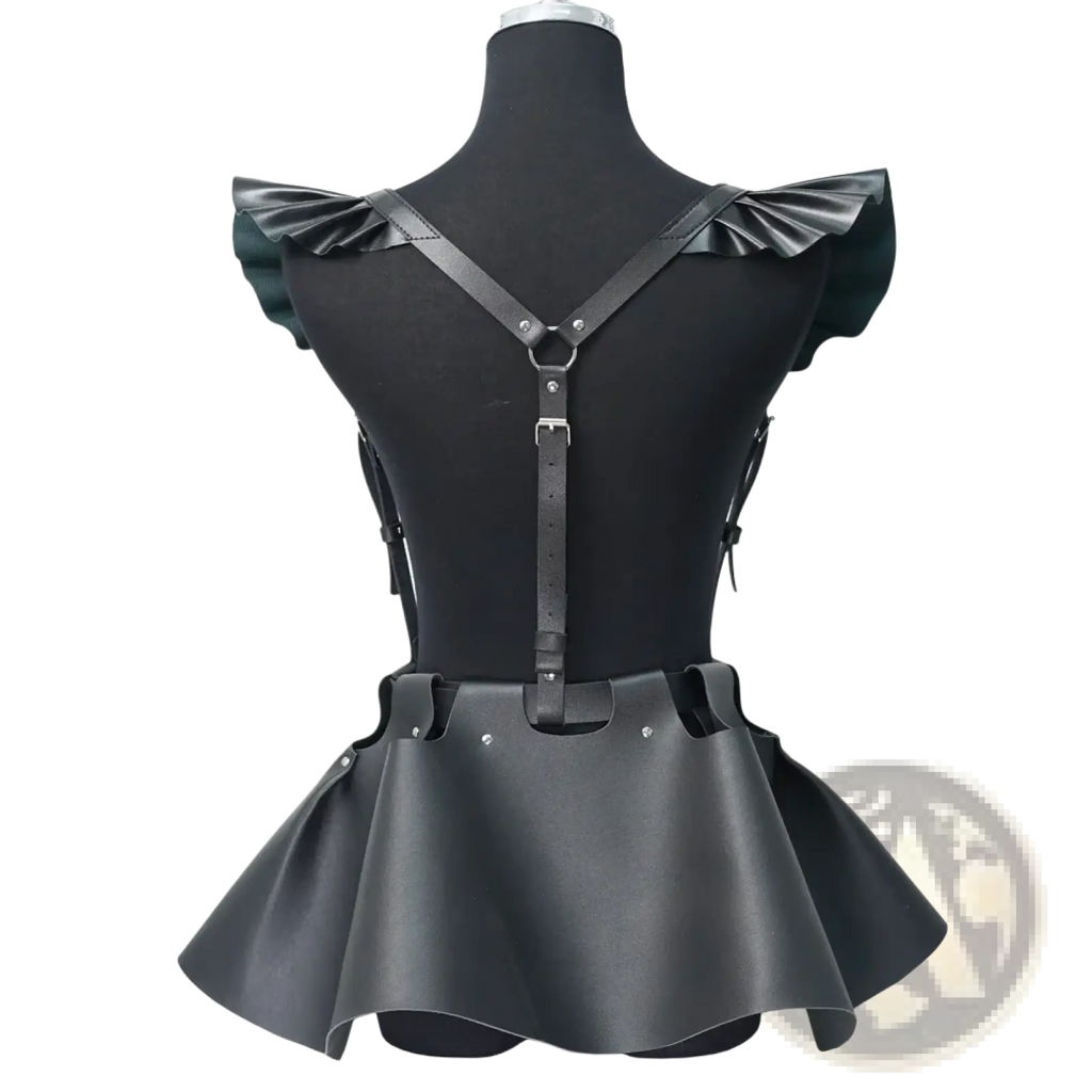 Black faux leather gothic harness skirt featuring a corset design with ruffled shoulder straps and flared hem