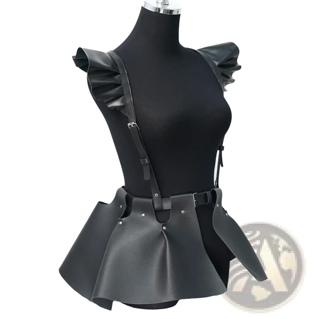 Black faux leather gothic leather harness skirt with ruffle hem featuring peplum top and ruffled shoulder straps
