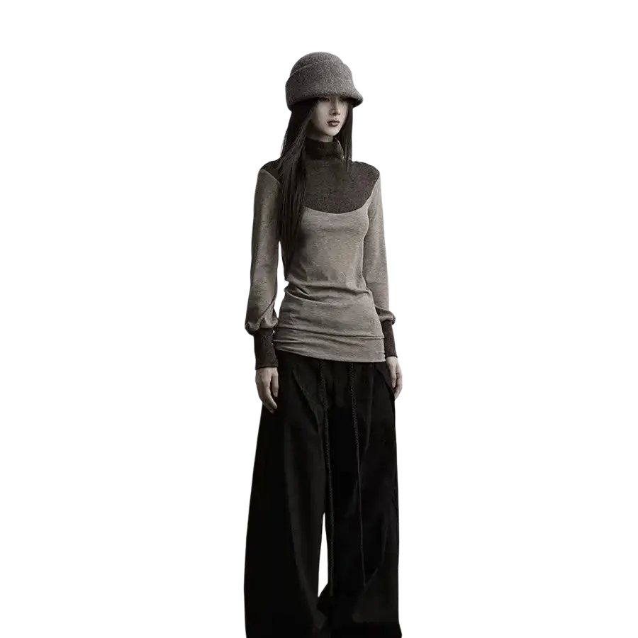 A woman wears a gothic two-tone long sleeve knit turtleneck top with dark brown panels in height 160-165cm size