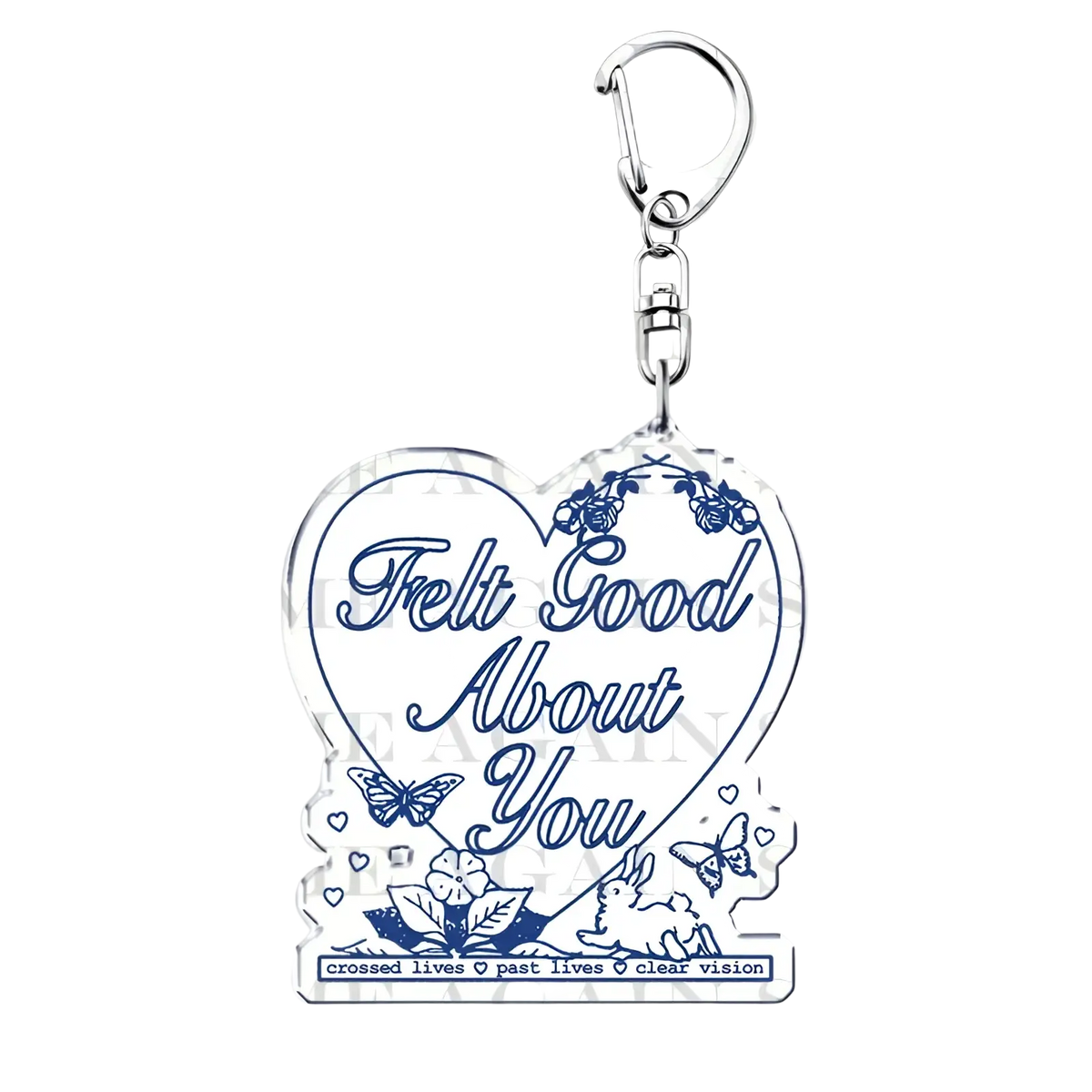 Clear heart-shaped acrylic keychain with blue floral butterfly designs and felt good about you script for anime fans