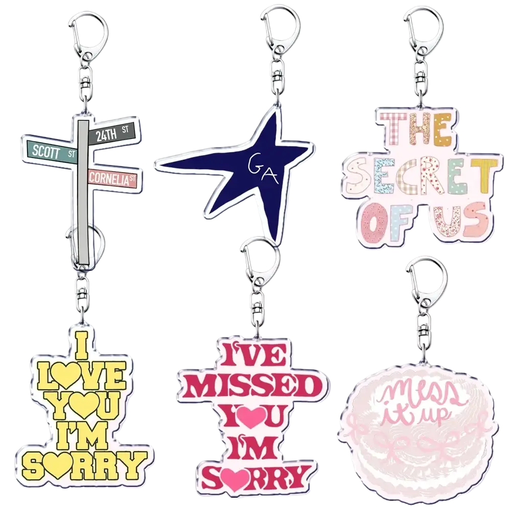 Six colorful acrylic keychains with metallic clasps featuring street signs stars and phrases for gracie abrams anime fans