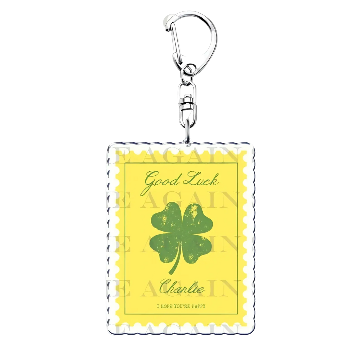 Yellow acrylic rectangular keychain with green four-leaf clover and good luck charlie text, silver metal clasp, anime fan gift
