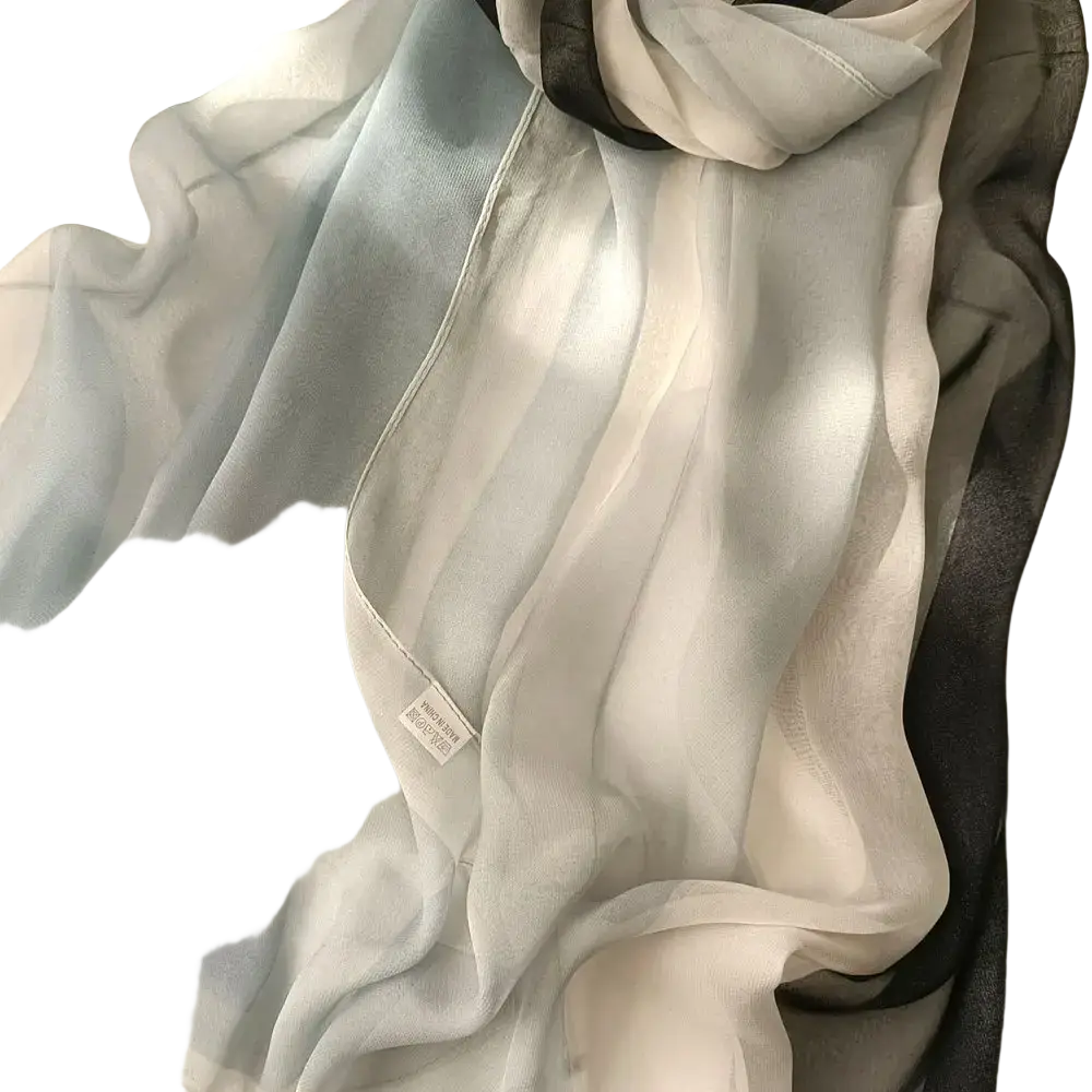 Gradient chiffon beach scarf shawl hijab with delicate sheer fabric and a soft light blue to white gradient with black edges