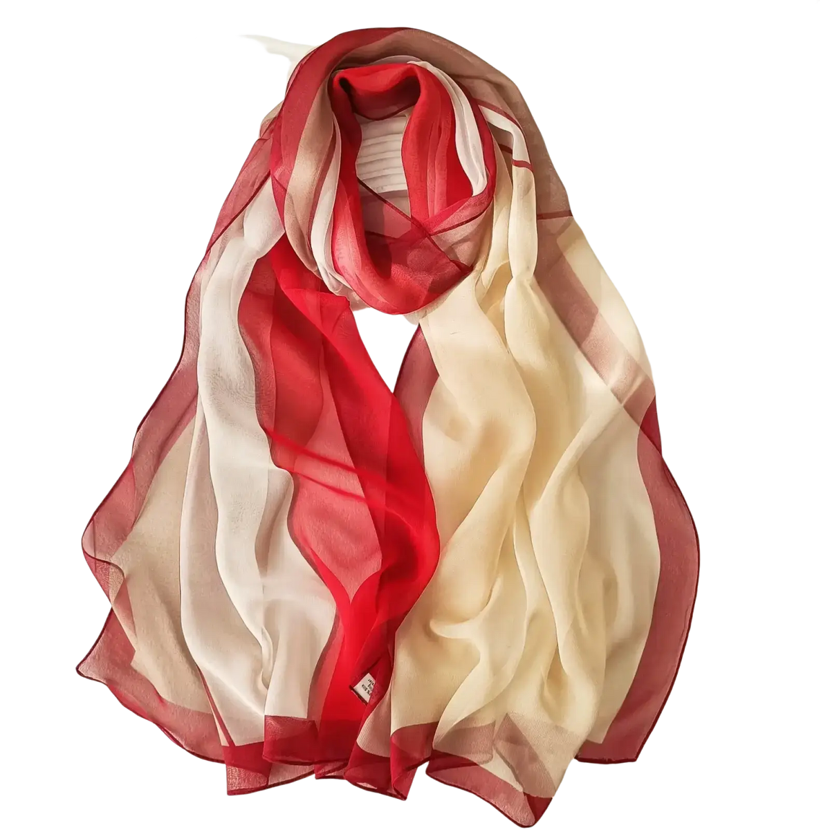 A flowing chiffon beach scarf shawl hijab featuring vibrant red and creamy beige gradient stripes in sheer fabric