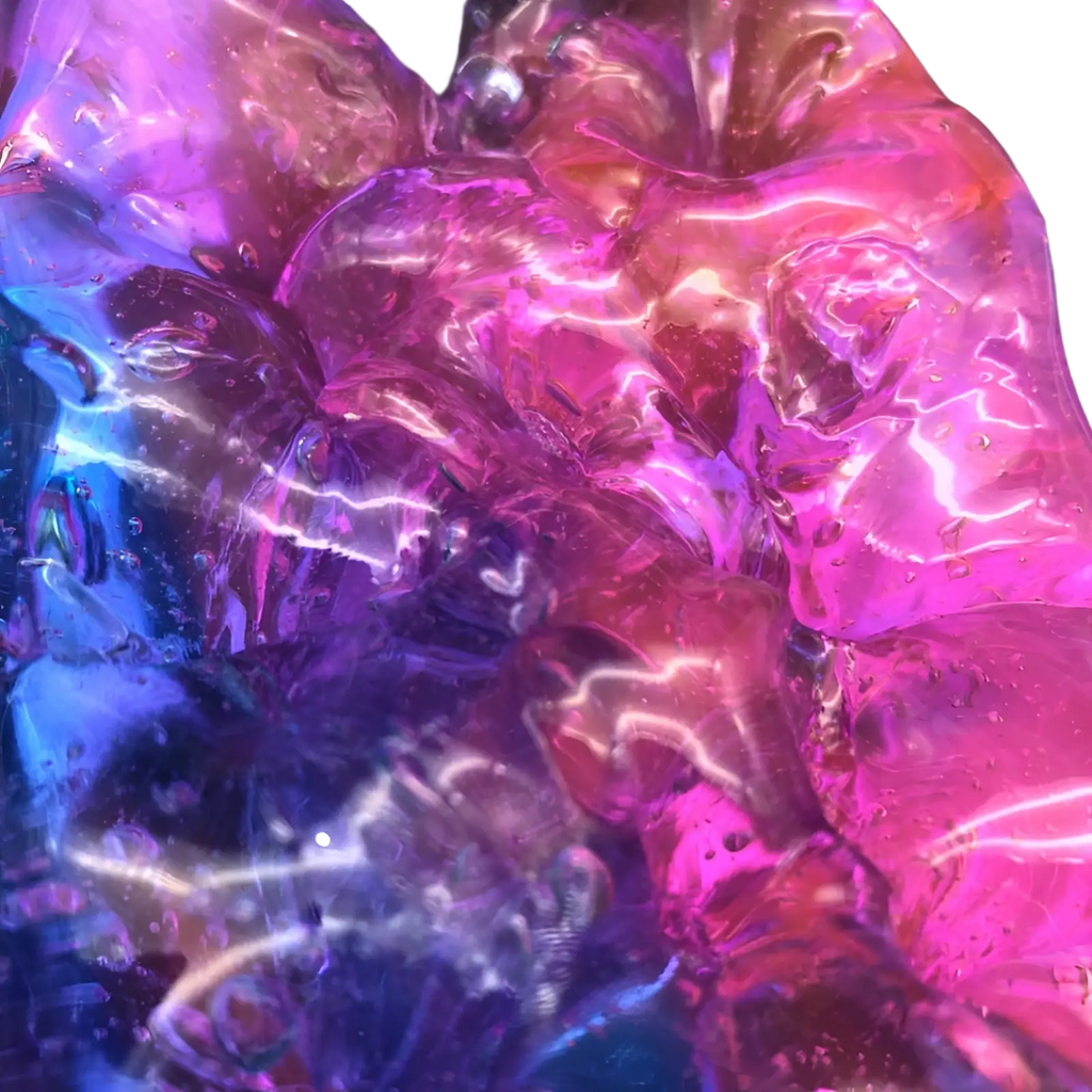 Gradient crystal mud slime putty toy in vibrant blue and purple with shimmering iridescent glossy translucent texture
