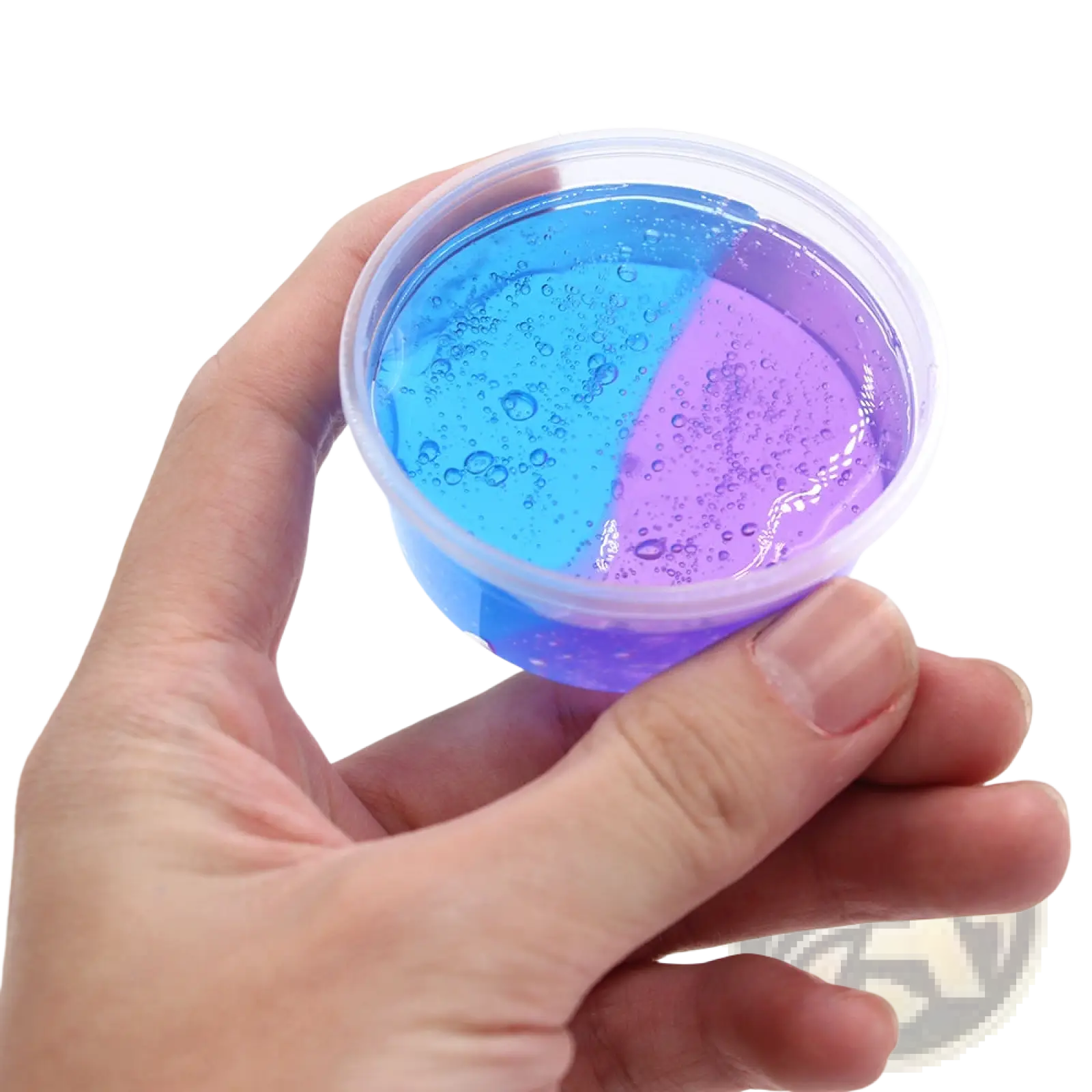 A hand holds a clear plastic cup with gradient crystal mud slime blue and purple putty toy showing two glossy halves