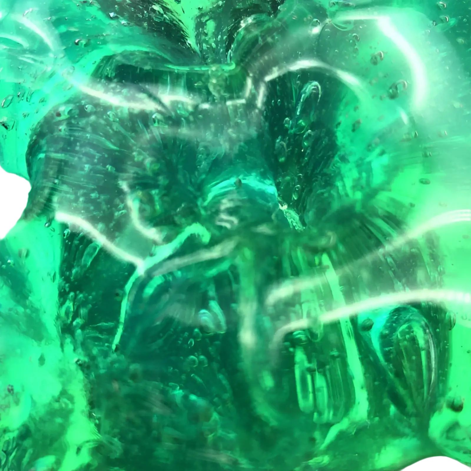 A translucent green glass sculpture with swirling patterns and bubbles featured in gradient crystal mud slime blue and purple putty toy