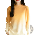 Gradient knit pullover sweater for women with a soft ribbed crew neckline and warm orange to creamy white colors