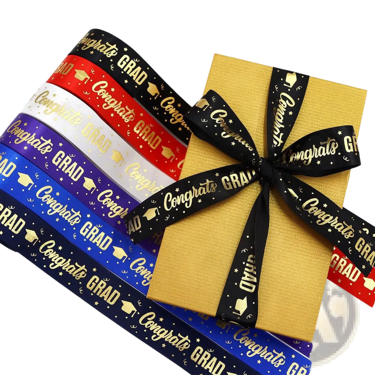 Graduation gift wrapping ribbon congrats grad satin black with gold text and cap motifs tied around a golden box